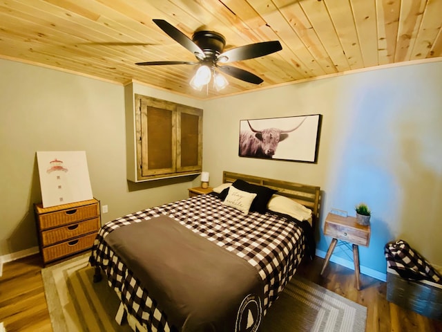 N14220 Island View Rd, Minong, WI 54859 - bedroom with wooden ceiling, crown molding, wood finished floors, and ceiling fan