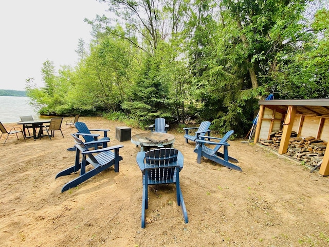 N14220 Island View Rd, Minong, WI 54859 - view of yard featuring an outdoor fire pit and a water view