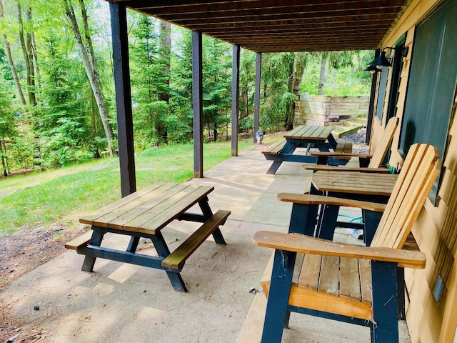 N14220 Island View Rd, Minong, WI 54859 - view of patio featuring a wooded view