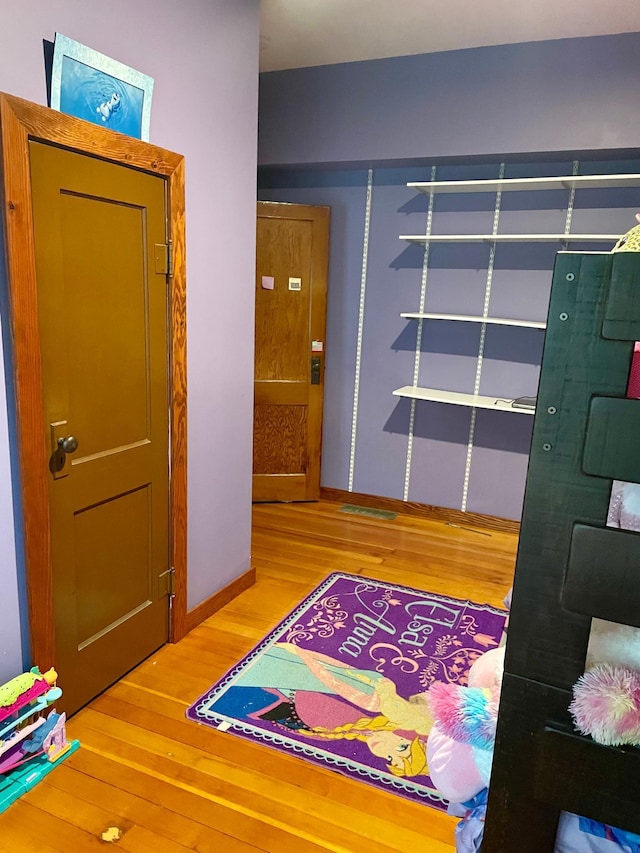 60 Main St, Kimball, MN 55353 - hallway with wood finished floors and baseboards