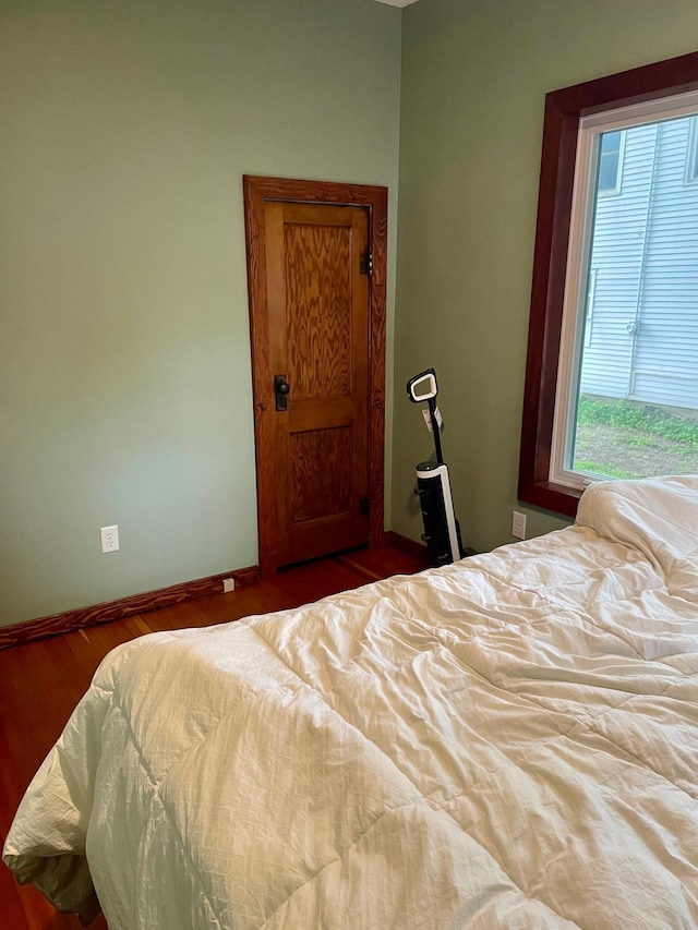 60 Main St, Kimball, MN 55353 - bedroom with multiple windows and wood finished floors