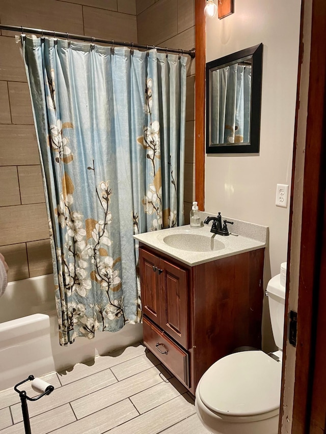 60 Main St, Kimball, MN 55353 - full bath featuring vanity, shower / bath combo with shower curtain, and wood finished floors