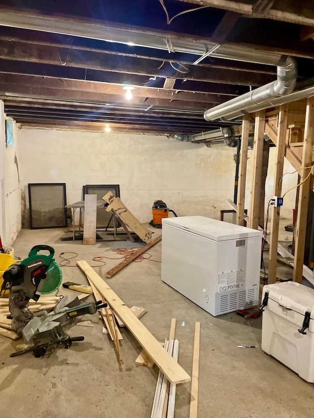 60 Main St, Kimball, MN 55353 - unfinished basement featuring fridge