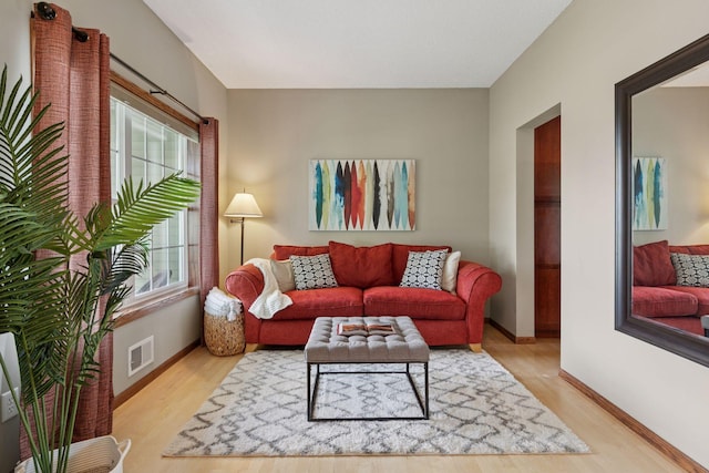 14896 Brenner Ct, Rosemount, MN 55068 - living area featuring light wood-style flooring and baseboards