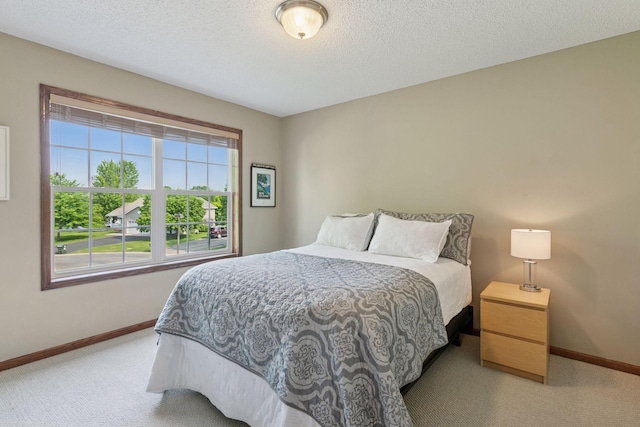 14896 Brenner Ct, Rosemount, MN 55068 - carpeted bedroom with baseboards and a textured ceiling