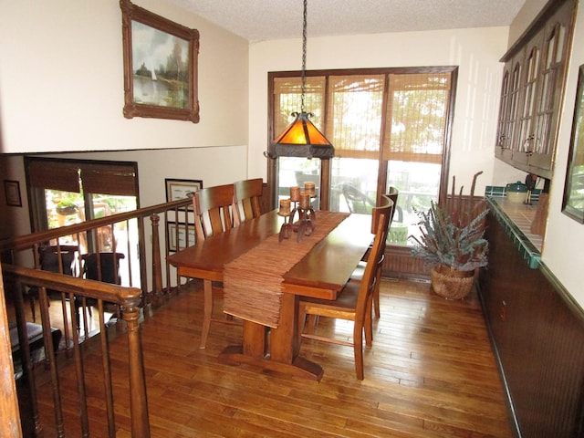 4523 Waville Rd NE, Bemidji, MN 56601 - dining space with hardwood / wood-style flooring and a textured ceiling