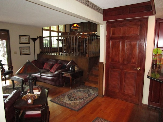 4523 Waville Rd NE, Bemidji, MN 56601 - living room with wood finished floors and stairs