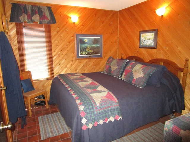 4523 Waville Rd NE, Bemidji, MN 56601 - tiled bedroom featuring wooden walls