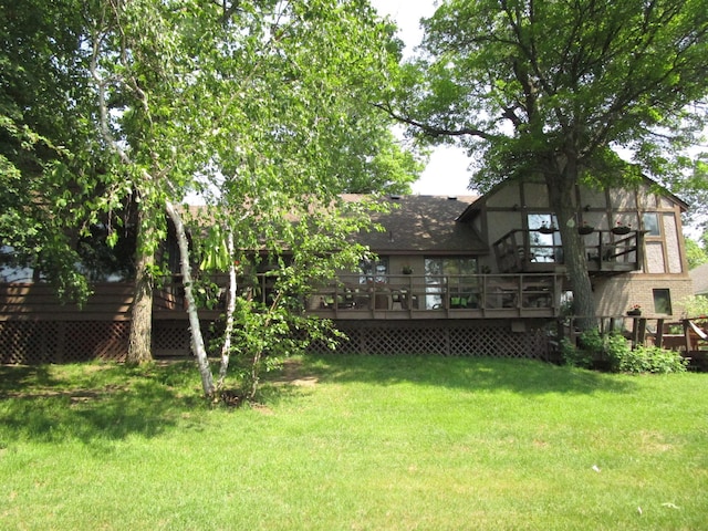 4523 Waville Rd NE, Bemidji, MN 56601 - view of grassy yard with a wooden deck