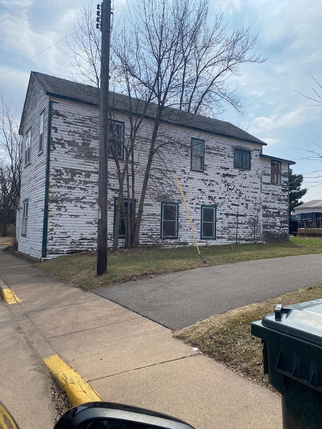 109 Courthouse Ave, Balsam Lake, WI 54810 - view of home's exterior with stone siding