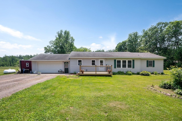 8241 120th St, Bogus Brook Twp, MN 56353 - ranch-style home with dirt driveway, an attached garage, a front lawn, and a deck