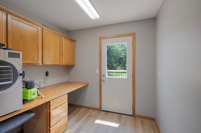 8241 120th St, Bogus Brook Twp, MN 56353 - office featuring built in study area and light wood finished floors