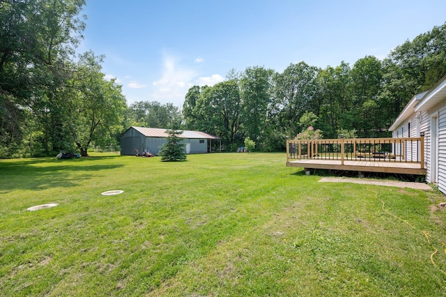 8241 120th St, Bogus Brook Twp, MN 56353 - view of grassy yard with a wooden deck