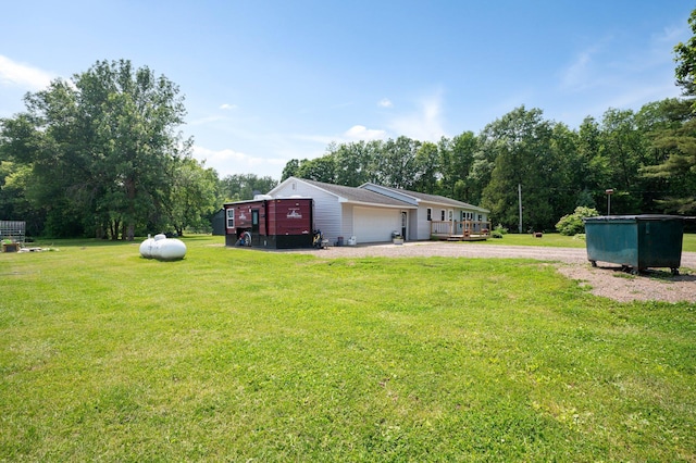 8241 120th St, Bogus Brook Twp, MN 56353 - view of grassy yard featuring gravel driveway