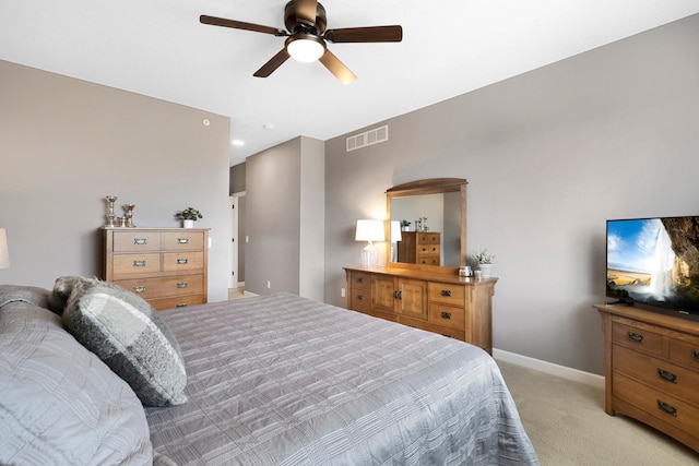 bedroom with light carpet and ceiling fan