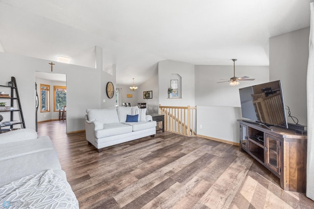 2819 33rd St S, Fargo, ND 58103 - living room featuring lofted ceiling, wood finished floors, ceiling fan, and a chandelier