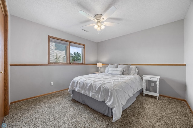 2819 33rd St S, Fargo, ND 58103 - bedroom with carpet, a textured ceiling, and a ceiling fan