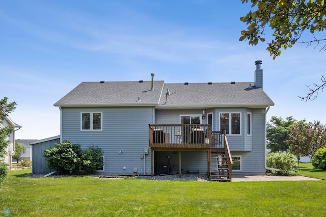 2819 33rd St S, Fargo, ND 58103 - rear view of house featuring stairs, a deck, a lawn, and a chimney