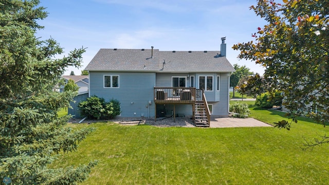2819 33rd St S, Fargo, ND 58103 - rear view of property featuring stairway, a wooden deck, a lawn, a chimney, and a patio area