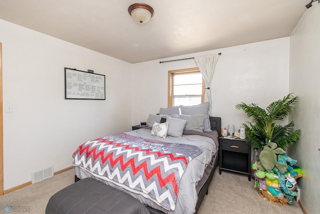 419 18th St S, Moorhead, MN 56560 - bedroom with light colored carpet and baseboards