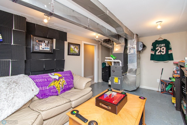 419 18th St S, Moorhead, MN 56560 - living room with finished concrete floors and heating unit