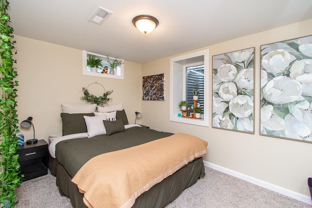 419 18th St S, Moorhead, MN 56560 - carpeted bedroom featuring baseboards