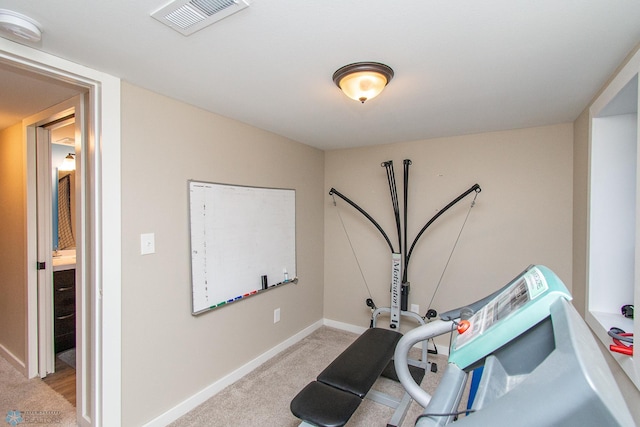 419 18th St S, Moorhead, MN 56560 - workout room featuring carpet and baseboards