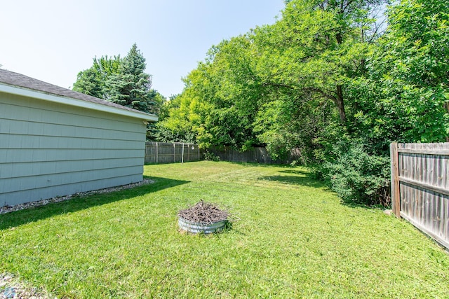 419 18th St S, Moorhead, MN 56560 - fenced backyard featuring a fire pit