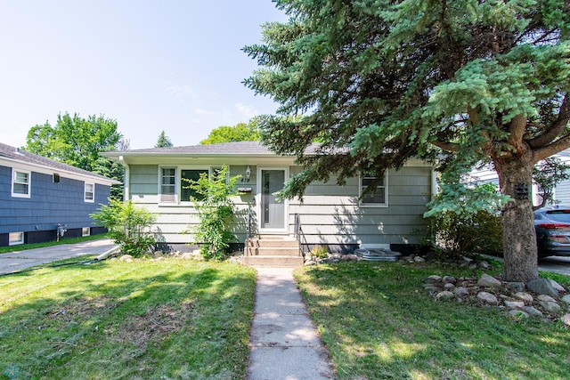 419 18th St S, Moorhead, MN 56560 - view of front of property with a front lawn and entry steps