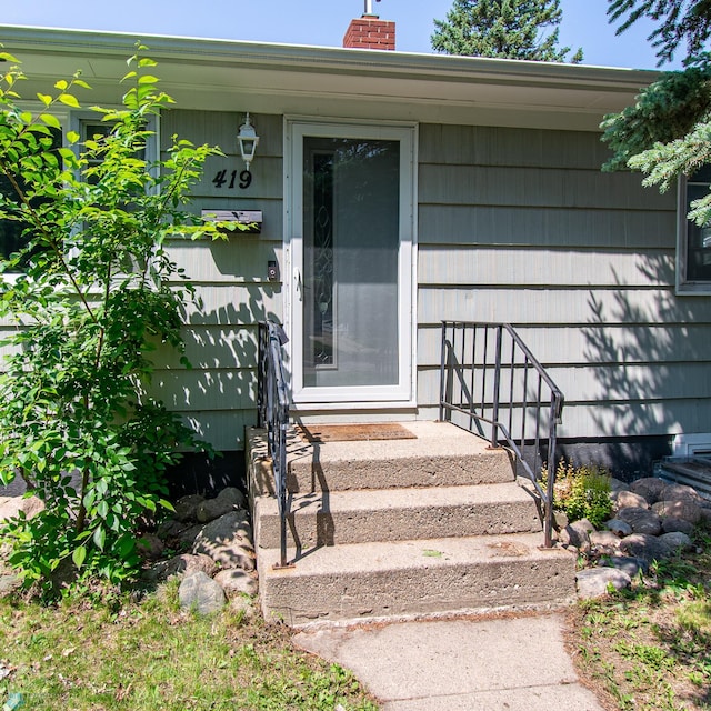 419 18th St S, Moorhead, MN 56560 - entrance to property featuring a chimney