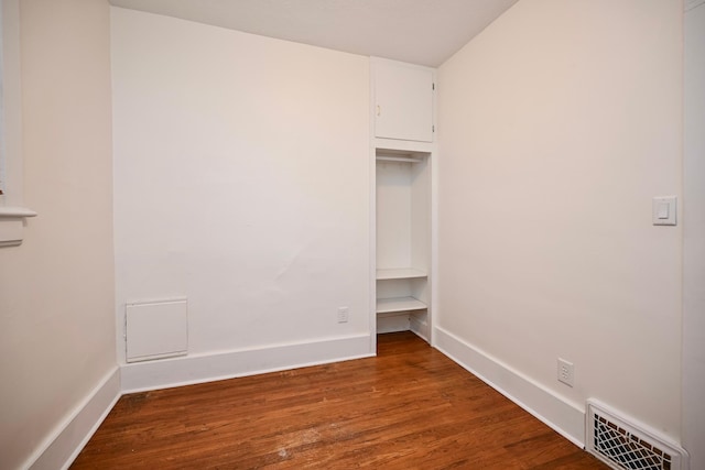 579 4th St, Winona, MN 55987 - unfurnished bedroom featuring wood finished floors