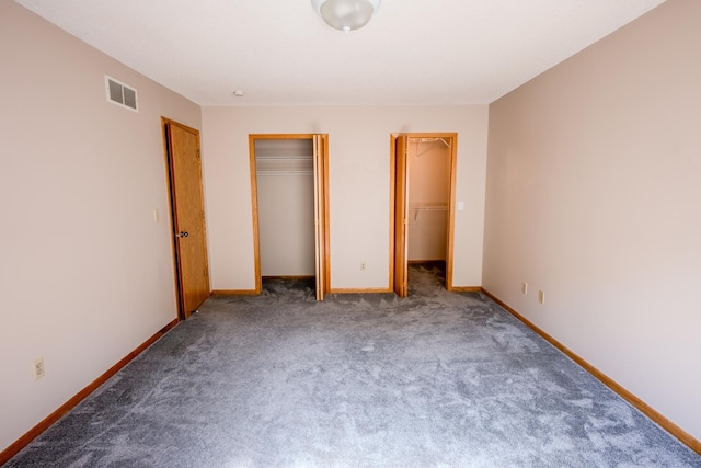 1865 Donegal Dr Unit 3, Woodbury, MN 55125 - unfurnished bedroom featuring carpet and two closets