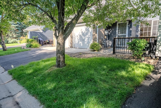 1865 Donegal Dr Unit 3, Woodbury, MN 55125 - view of front of home featuring driveway and a garage