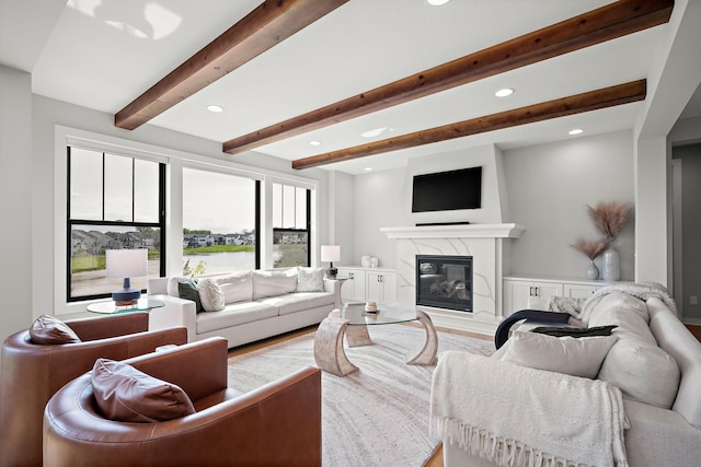 4805 Comstock Ln N, Plymouth, MN 55446 - living area featuring recessed lighting, beam ceiling, a premium fireplace, and wood finished floors