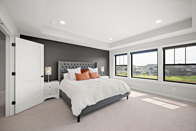 4805 Comstock Ln N, Plymouth, MN 55446 - bedroom featuring light colored carpet, a tray ceiling, and recessed lighting