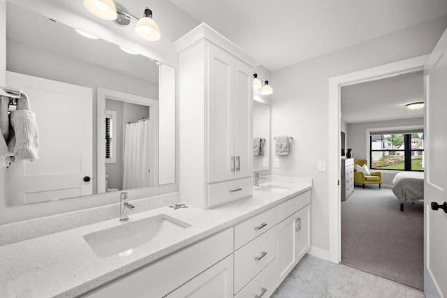 4805 Comstock Ln N, Plymouth, MN 55446 - ensuite bathroom featuring double vanity and toilet