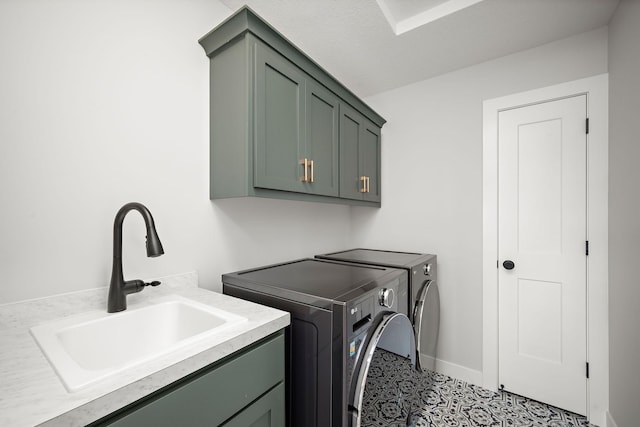 4805 Comstock Ln N, Plymouth, MN 55446 - laundry area featuring washer and clothes dryer, cabinet space, and tile patterned floors