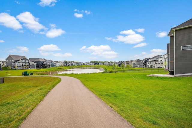 4805 Comstock Ln N, Plymouth, MN 55446 - view of community featuring a residential view, a water view, and a yard