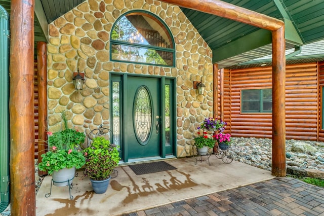 53245 Sunrise Ln, Park Rapids, MN 56470 - entrance to property featuring stone siding and covered porch