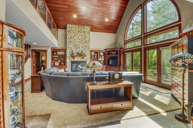 53245 Sunrise Ln, Park Rapids, MN 56470 - carpeted living area featuring high vaulted ceiling, wooden ceiling, a fireplace, and tile patterned flooring