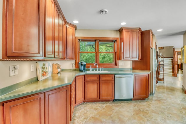53245 Sunrise Ln, Park Rapids, MN 56470 - kitchen with stainless steel appliances, brown cabinets, and recessed lighting