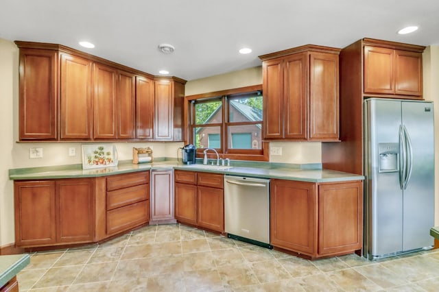 53245 Sunrise Ln, Park Rapids, MN 56470 - kitchen with appliances with stainless steel finishes, brown cabinets, recessed lighting, and light countertops