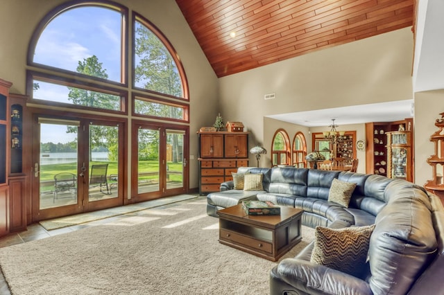 53245 Sunrise Ln, Park Rapids, MN 56470 - living area with high vaulted ceiling, wood ceiling, a chandelier, and a water view