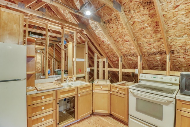 53245 Sunrise Ln, Park Rapids, MN 56470 - kitchen featuring white appliances, vaulted ceiling, light brown cabinets, and light countertops