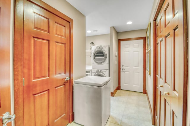 53245 Sunrise Ln, Park Rapids, MN 56470 - washroom with stacked washing machine and dryer, light tile patterned floors, and recessed lighting
