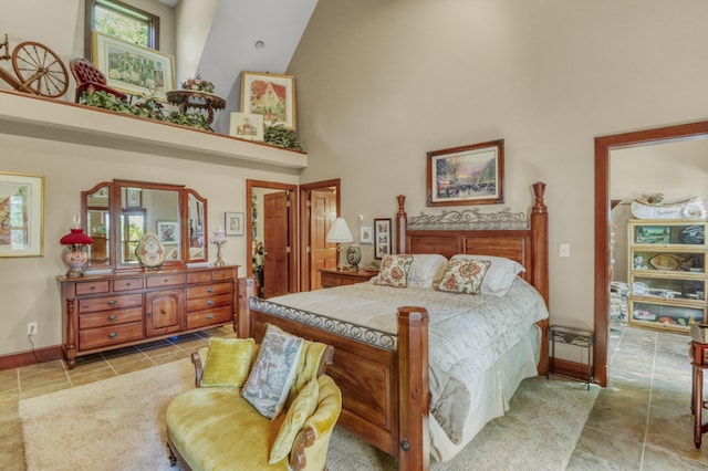 53245 Sunrise Ln, Park Rapids, MN 56470 - bedroom featuring a towering ceiling and light tile patterned floors