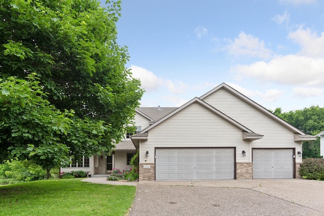 9534 Kirkwood Way N, Maple Grove, MN 55369 - view of front facade featuring brick siding, an attached garage, driveway, a front lawn, and roof with shingles