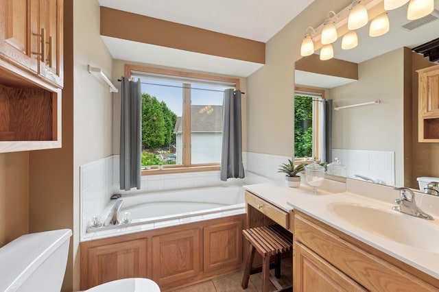 9534 Kirkwood Way N, Maple Grove, MN 55369 - bathroom featuring a garden tub, vanity, and tile patterned floors