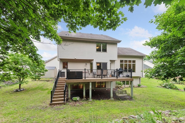 9534 Kirkwood Way N, Maple Grove, MN 55369 - back of property with stairs, a wooden deck, and a yard