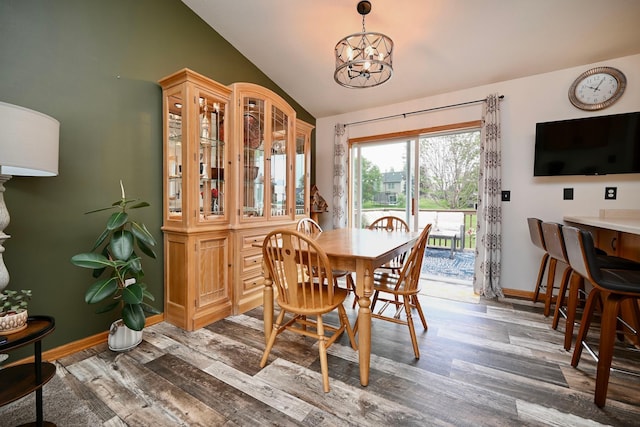 404 3rd Way SE, Dover, MN 55929 - dining room with vaulted ceiling, a chandelier, and wood finished floors